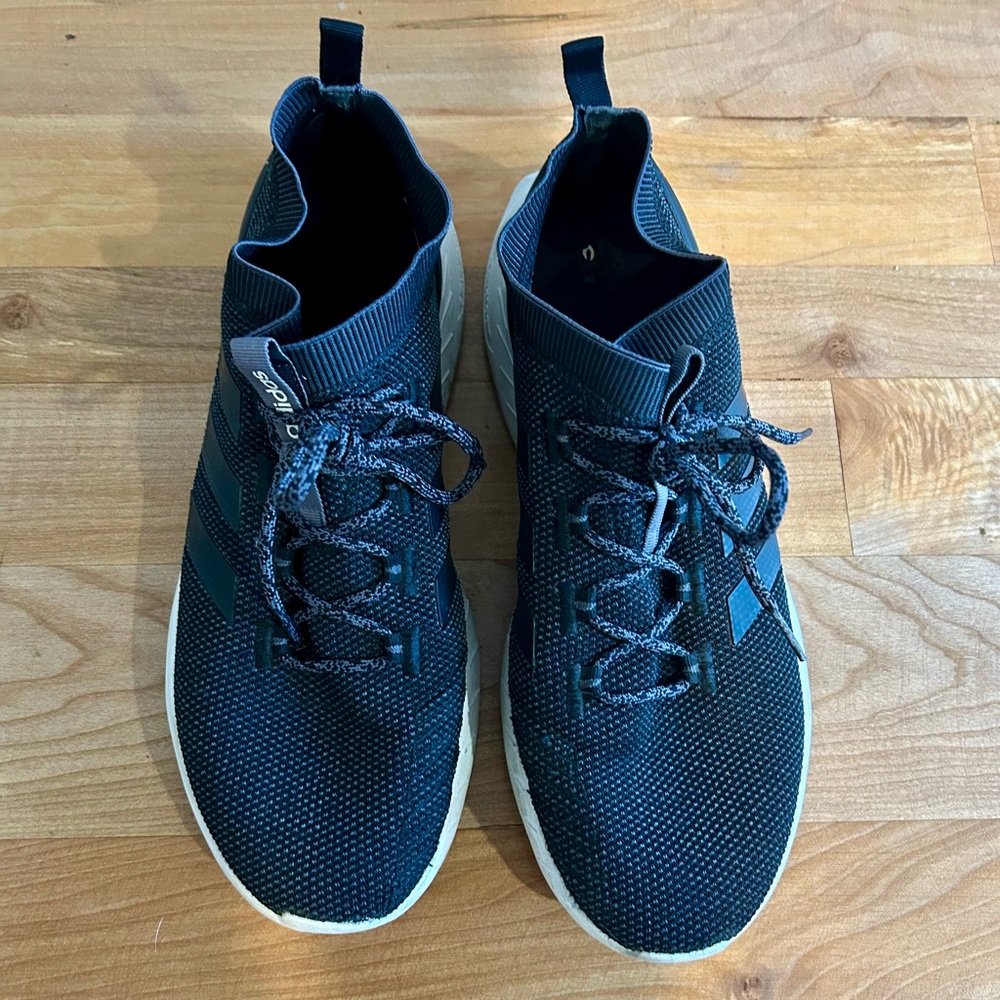 Adidas Men’s size 11.5 black tennis shoes.